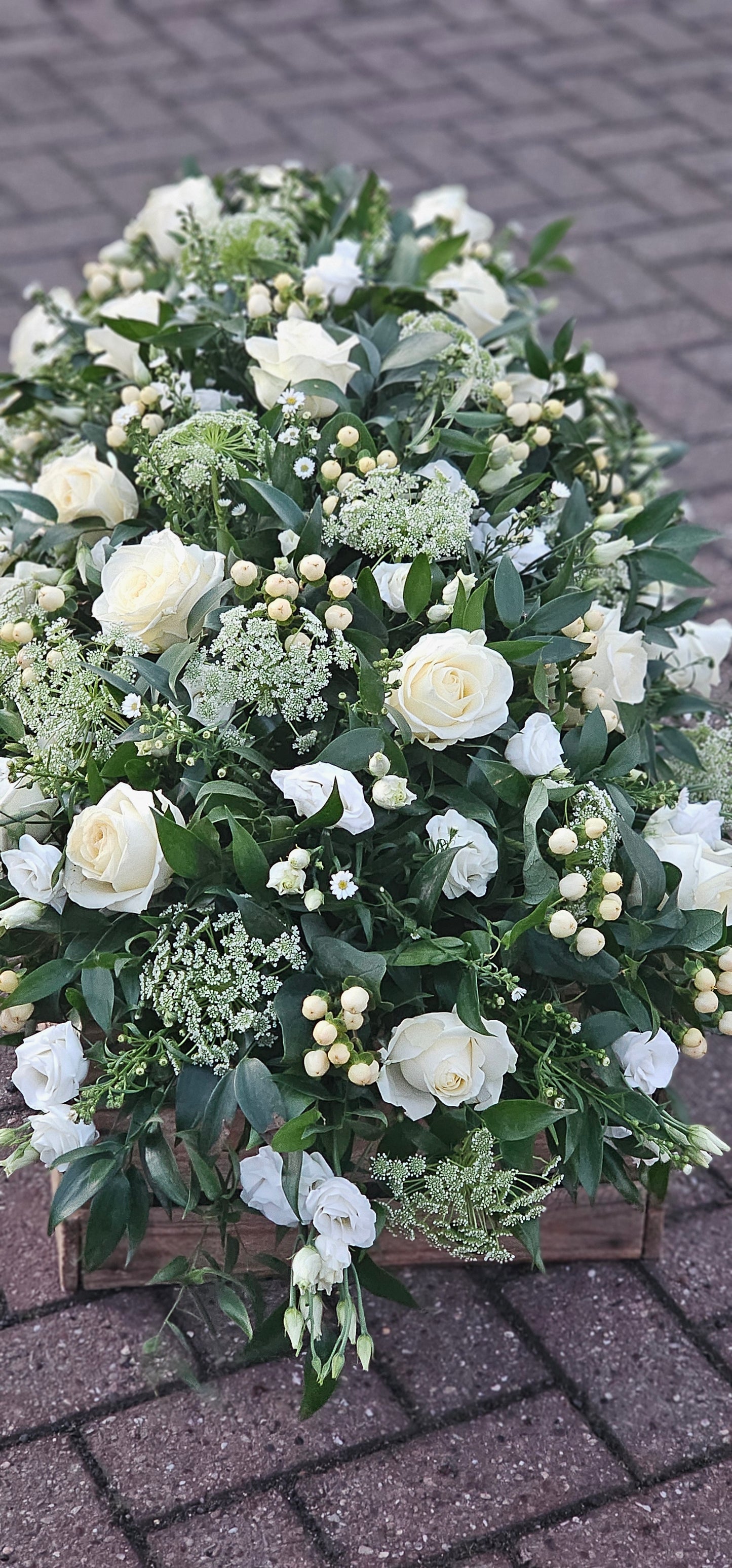 White rose and mixed flower spray